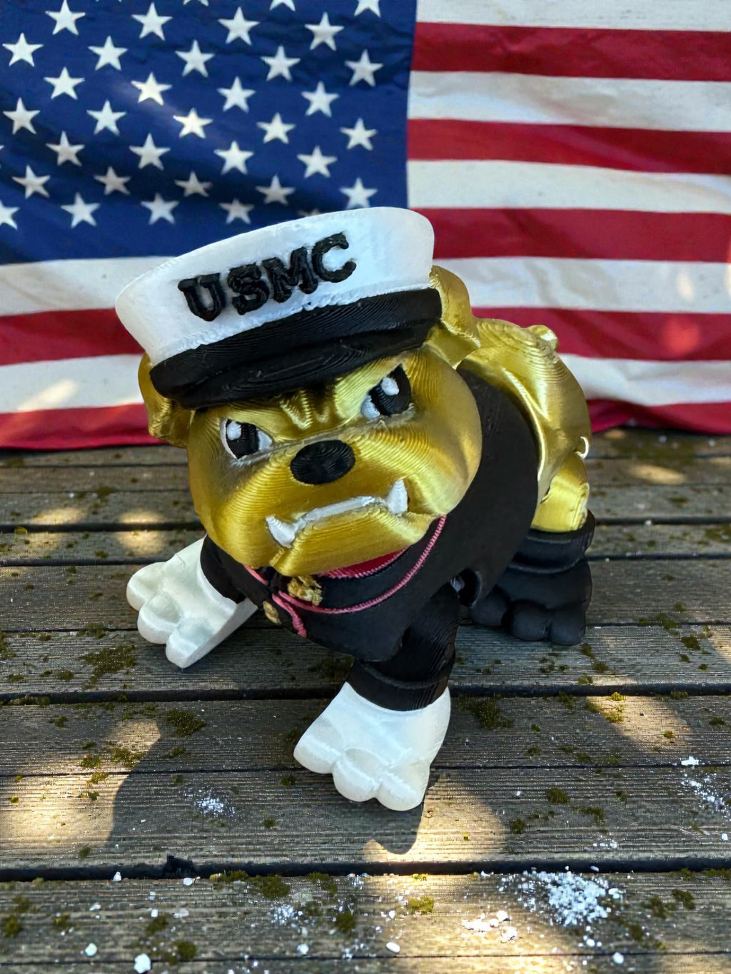 Crafted For Courage USMC bulldog figurine in uniform with gold body and black uniform.