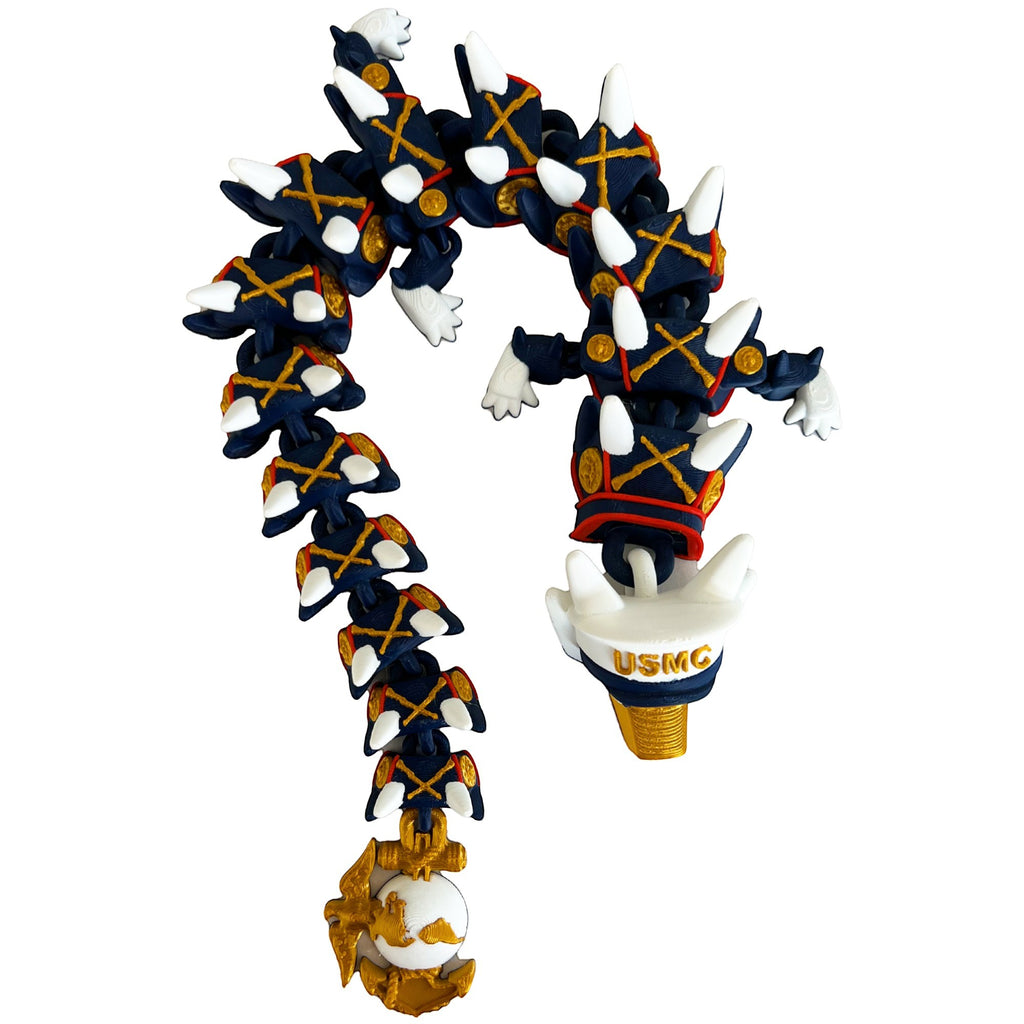 Crafted For Courage USMC dragon figure in navy blue uniform with gold accents and white details, holding a globe and anchor emblem.