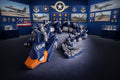 Crafted For Courage USMC Dragon model, a blue and orange articulated dragon with USAF insignia, featuring jet engine details.
