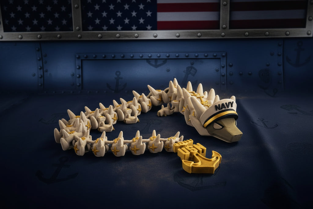Crafted For Courage USMC Dragon toy with USN anchor and Navy hat.